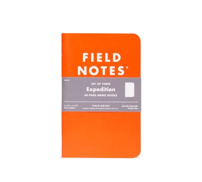 Expedition Edition waterproof notebook with orange cover.