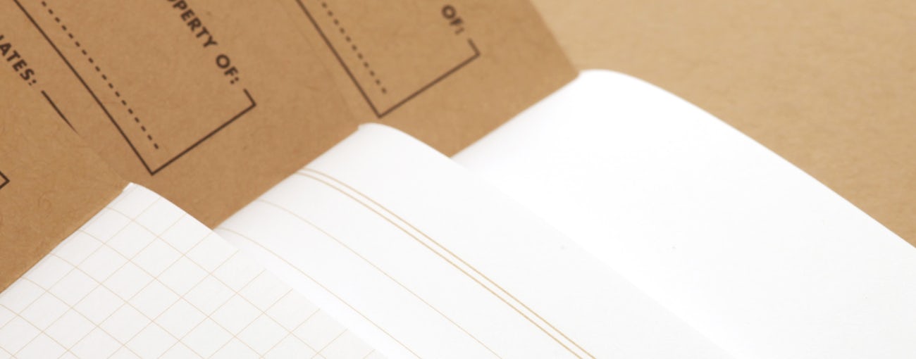 Close up of Original Kraft notebooks showing graph, ruled, and plain paper styles.
