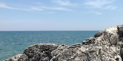 Photo of lake with rocks